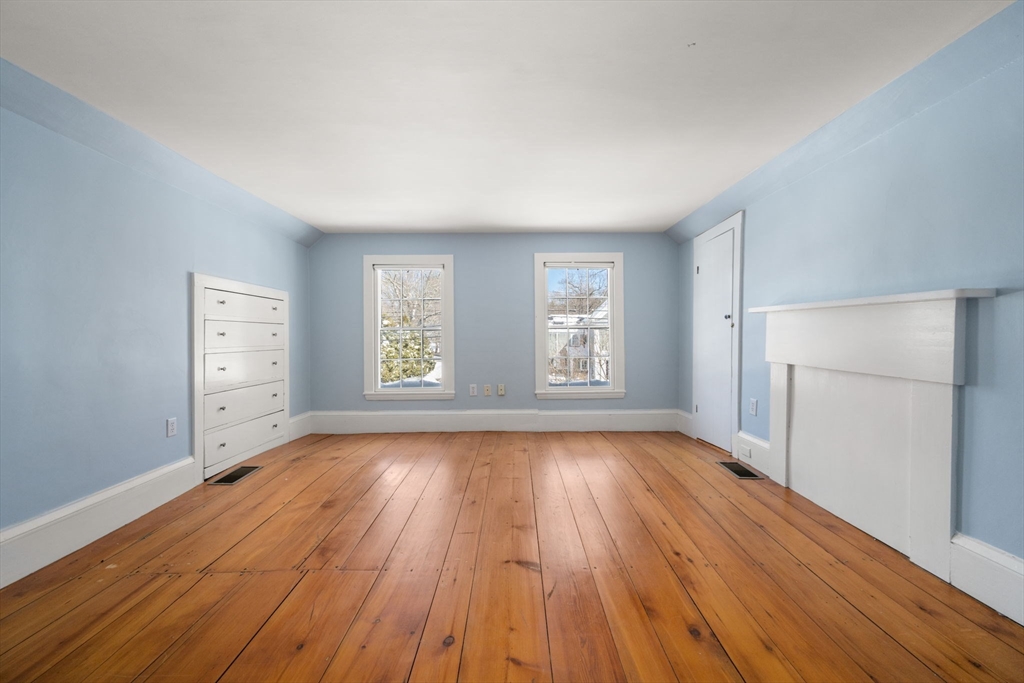 2 Old Sudbury Road Wayland, MA 01778 - Photo 33 of 40 wooden floor in an empty room with a window