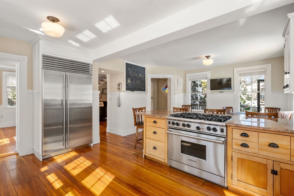 2 Old Sudbury Road Wayland, MA 01778 - Photo 7 of 40 a kitchen with a stove top oven and refrigerator