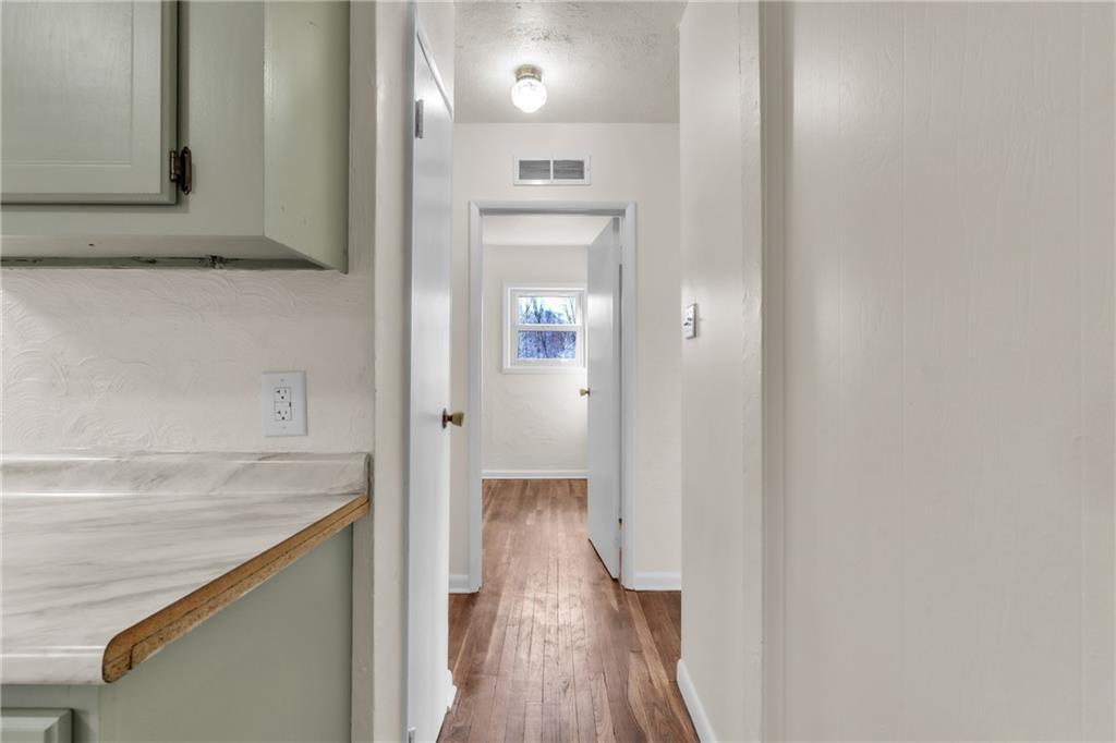 157 Studebaker Road Slippery Rock, PA 16057 - Photo 11 of 34 a view of a hallway with wooden floor