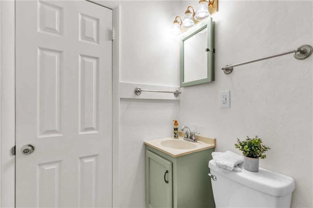157 Studebaker Road Slippery Rock, PA 16057 - Photo 13 of 34 a bathroom with a sink toilet and mirror