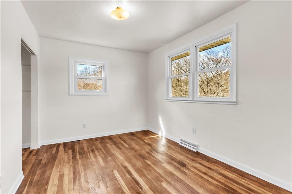 157 Studebaker Road Slippery Rock, PA 16057 - Photo 21 of 34 a view of empty room with wooden floor