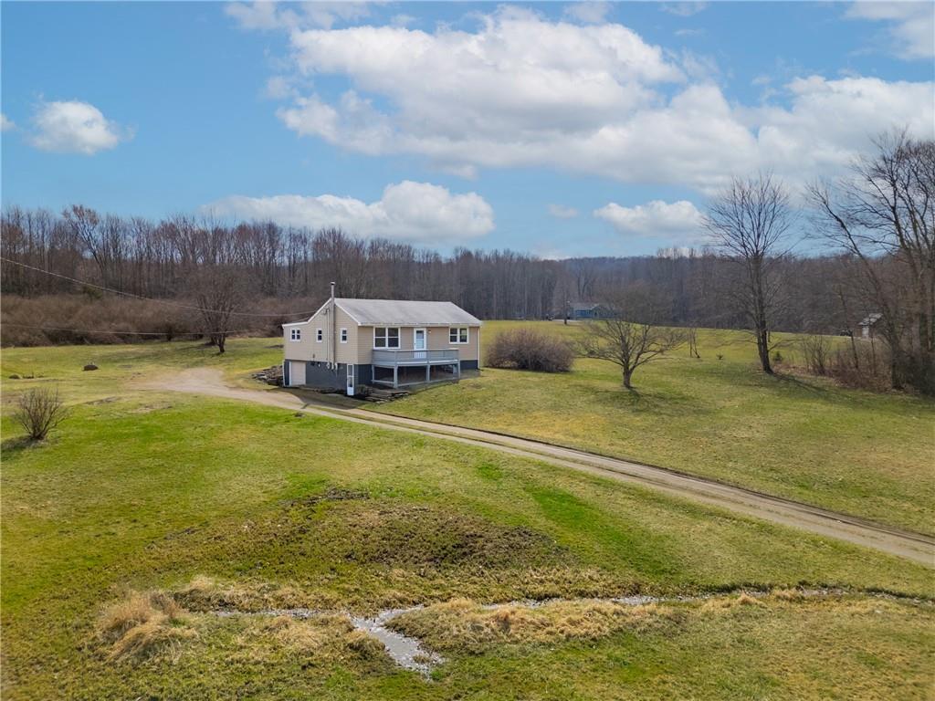 157 Studebaker Road Slippery Rock, PA 16057 - Photo 27 of 34 a view of a swimming pool with a yard