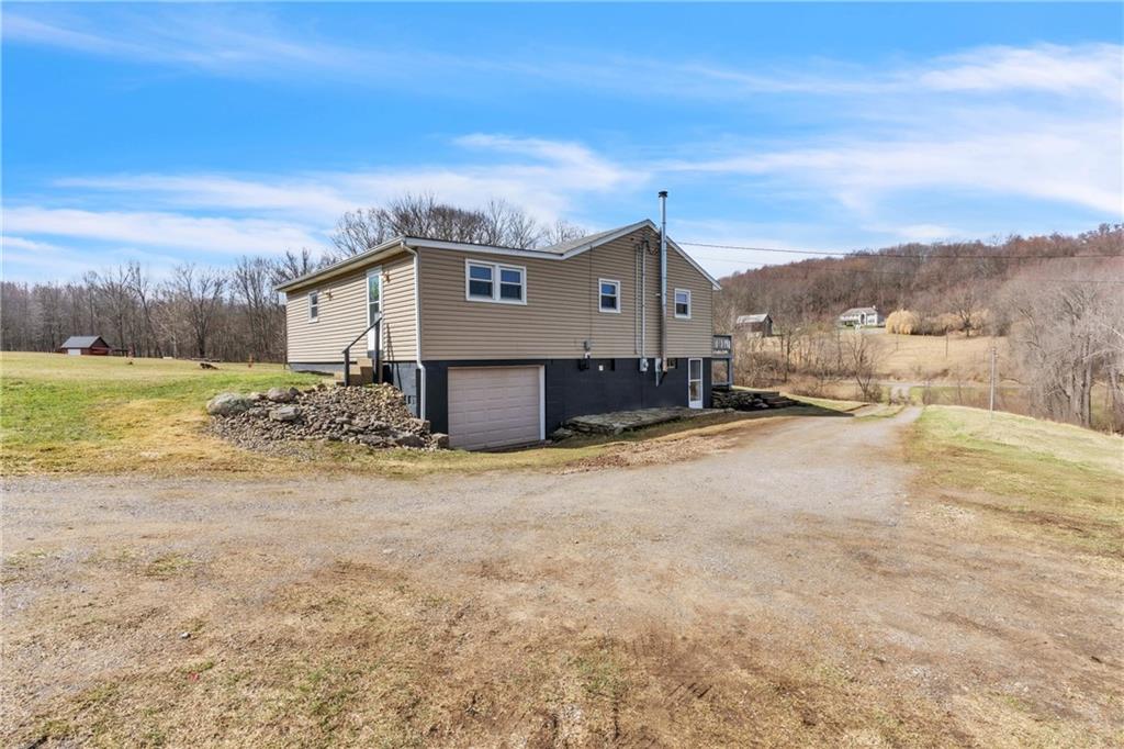 157 Studebaker Road Slippery Rock, PA 16057 - Photo 29 of 34 a view of a house with a yard