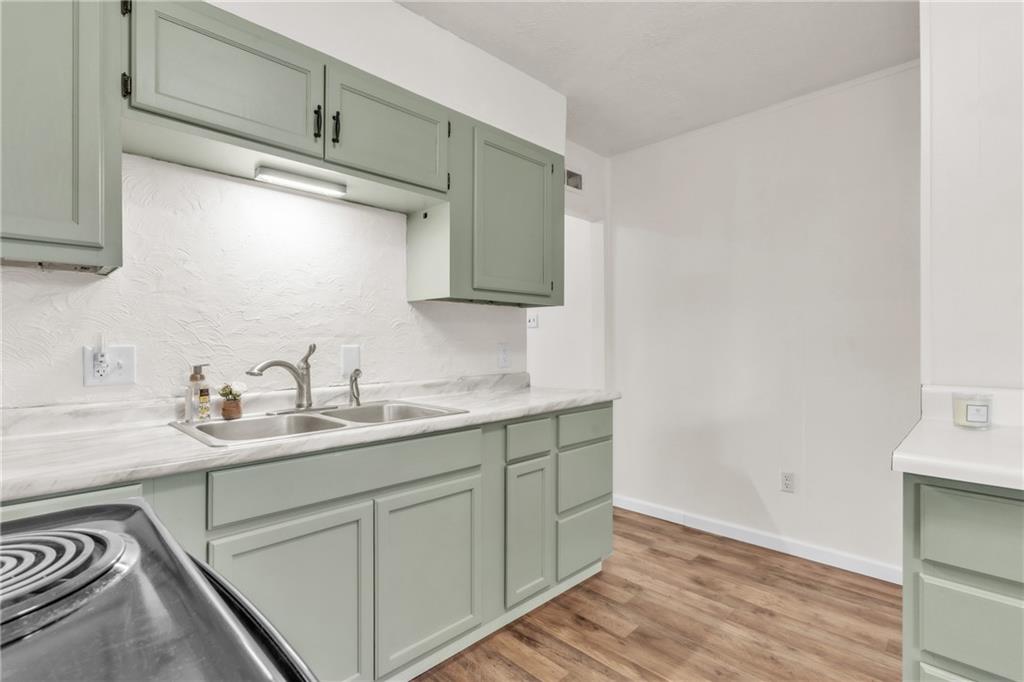 157 Studebaker Road Slippery Rock, PA 16057 - Photo 7 of 34 a kitchen with a sink and cabinets