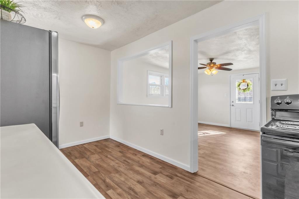 157 Studebaker Road Slippery Rock, PA 16057 - Photo 8 of 34 wooden floor in an empty room and a window