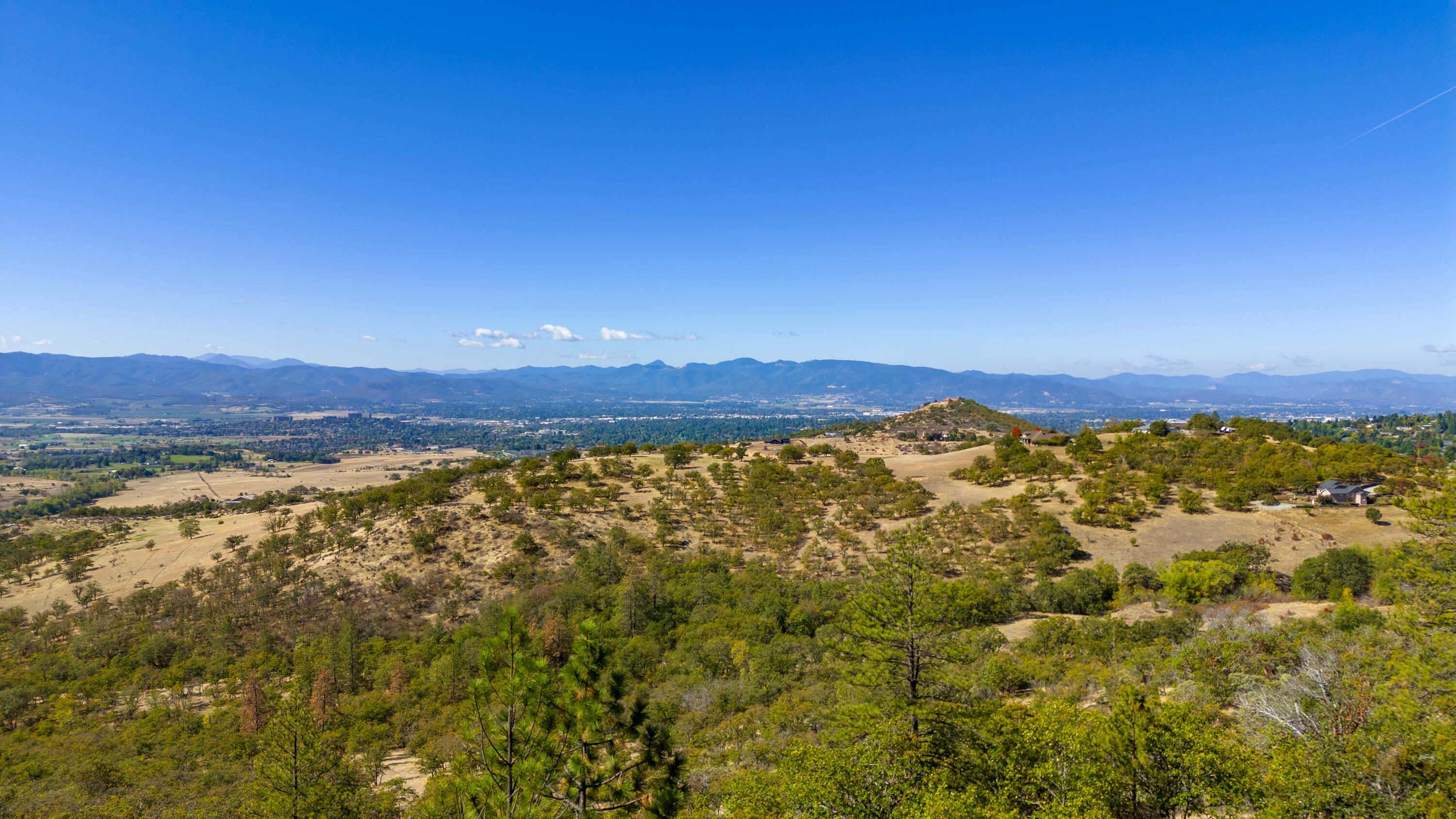 5880 Hillcrest Road Medford, OR 97504 - Photo 14 of 43 a view of a city with mountains in the background
