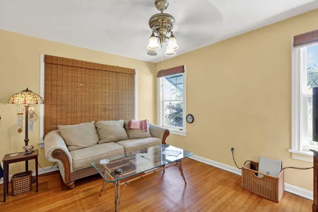 a view of a chairs and table in a patio