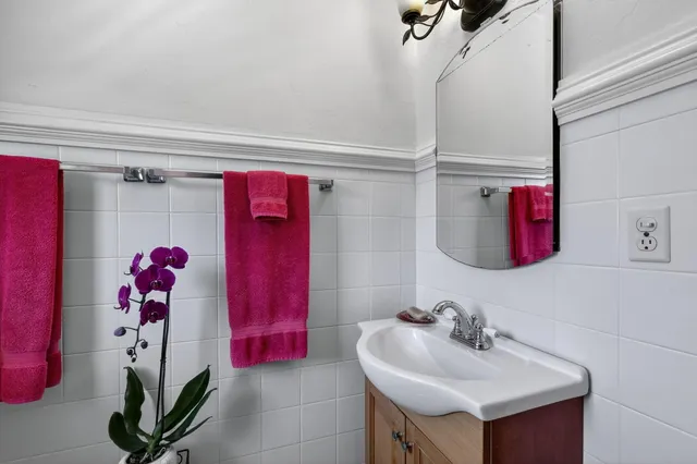 a backyard of a house with outdoor seating