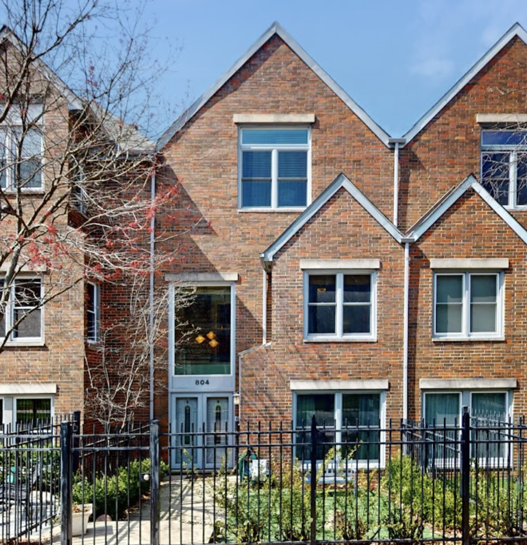 804 South Morgan Street Chicago, IL 60607 - Photo 1 of 32 a view of a brick house with large windows