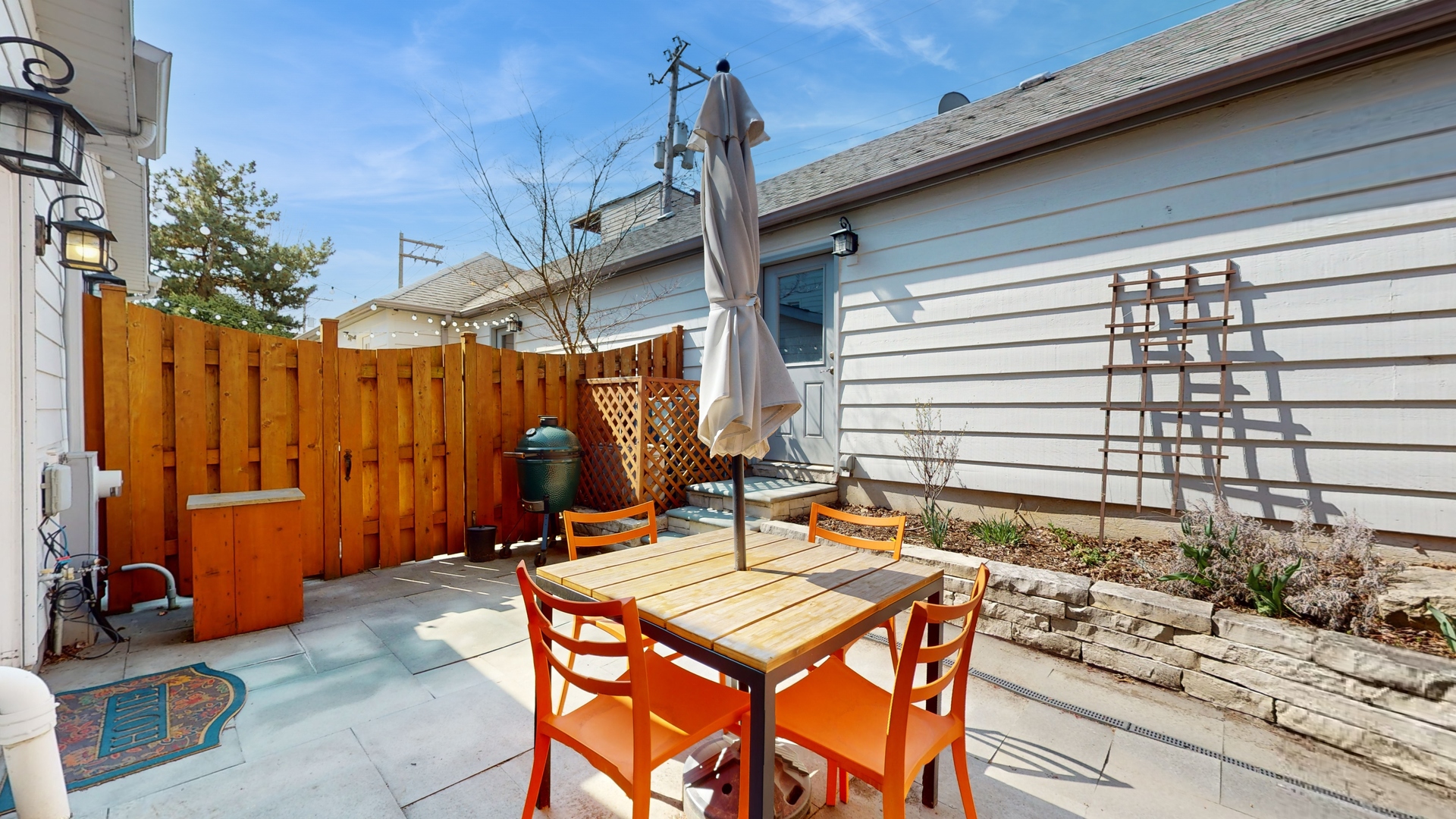 804 South Morgan Street Chicago, IL 60607 - Photo 15 of 32 a backyard of a house with barbeque oven table and chairs