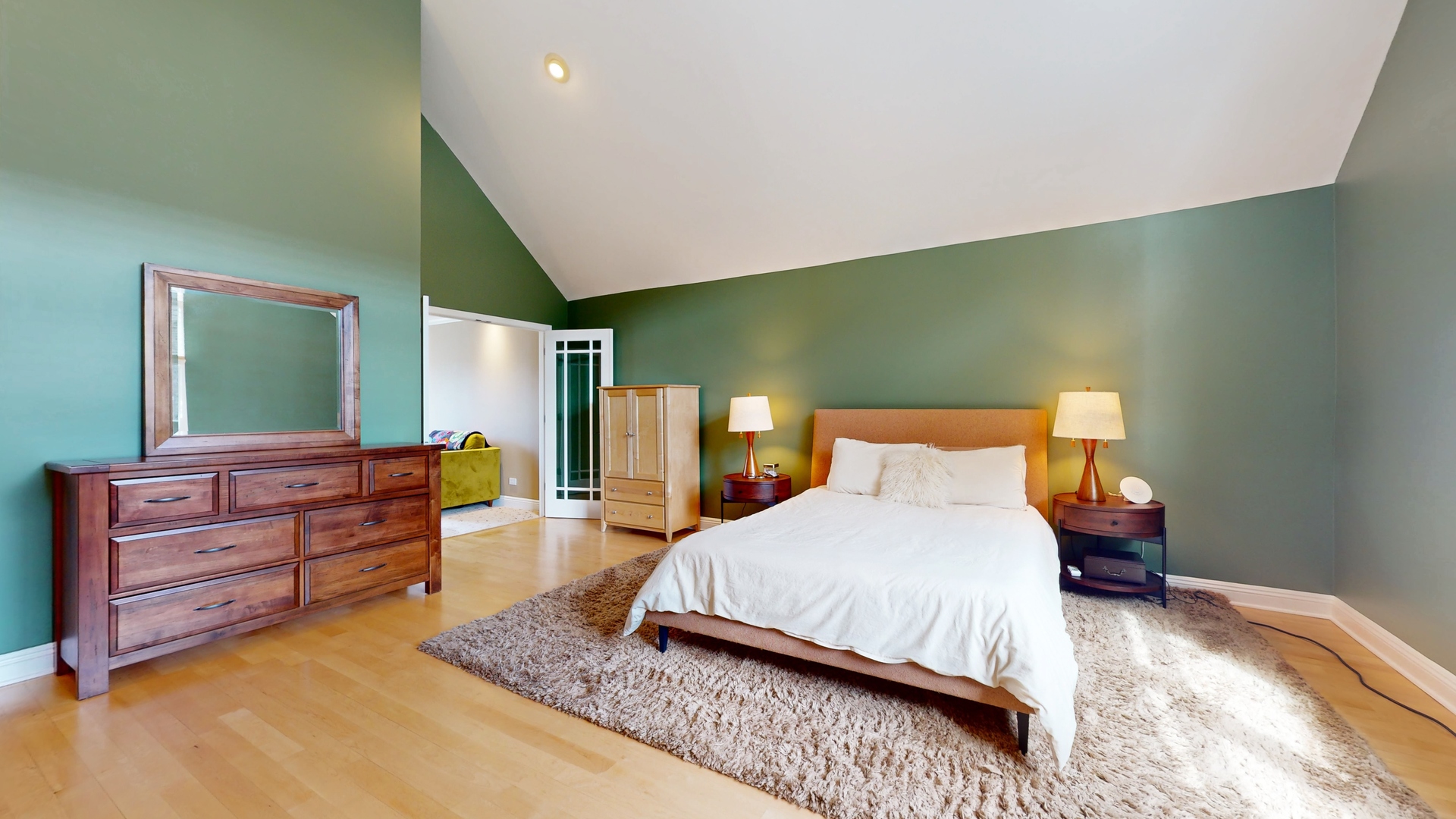 804 South Morgan Street Chicago, IL 60607 - Photo 25 of 32 a bedroom with a bed and large mirror on dresser