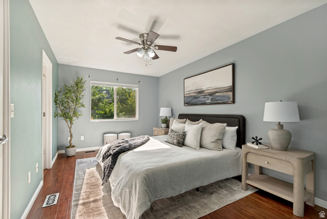 11798 Spiraea Way Draper, UT 84020 - Photo 15 of 21 Spacious room featuring wood-finish flooring, a contemporary ceiling fan with lighting, and light blue wall paint