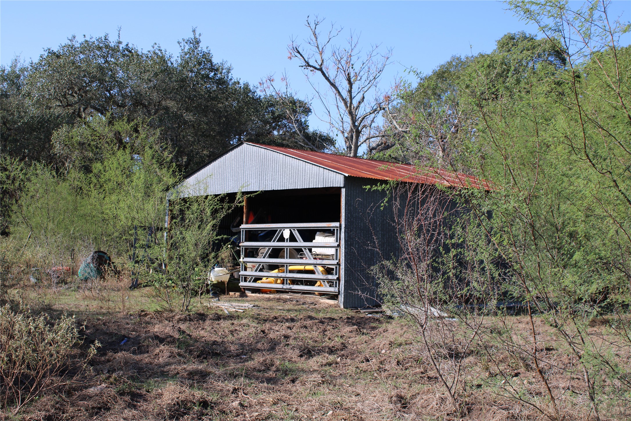 3514 US 90 Glidden, TX 78943 - Photo 8 of 18 a front view of a house with garden