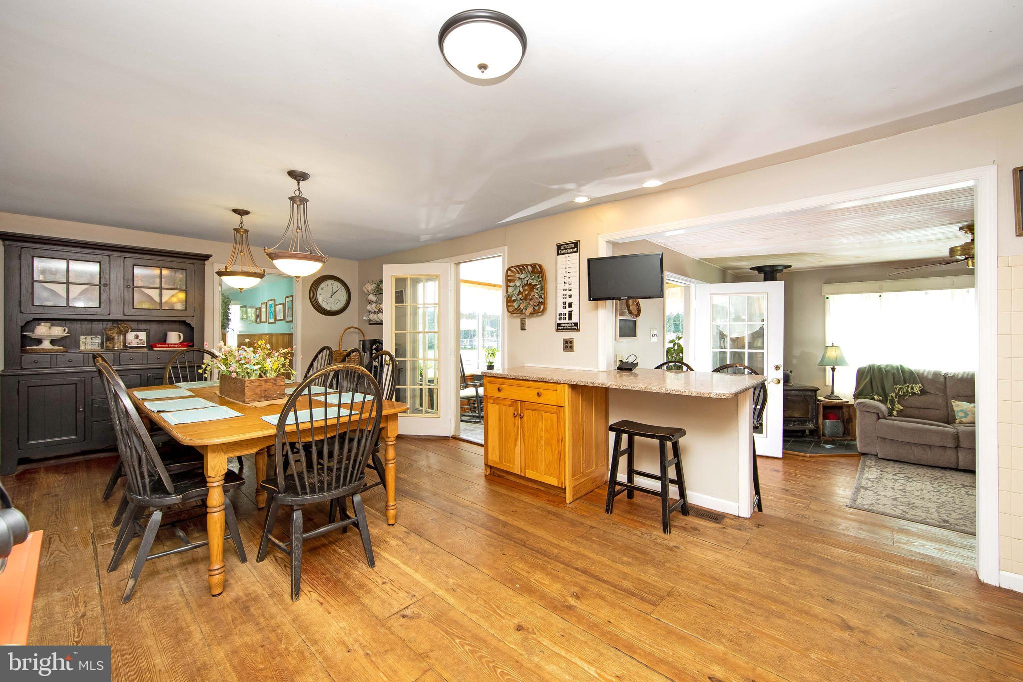 27 Wicklow Drive Tabernacle, NJ 08088 - Photo 12 of 65 a view of a dining room with furniture and wooden floor