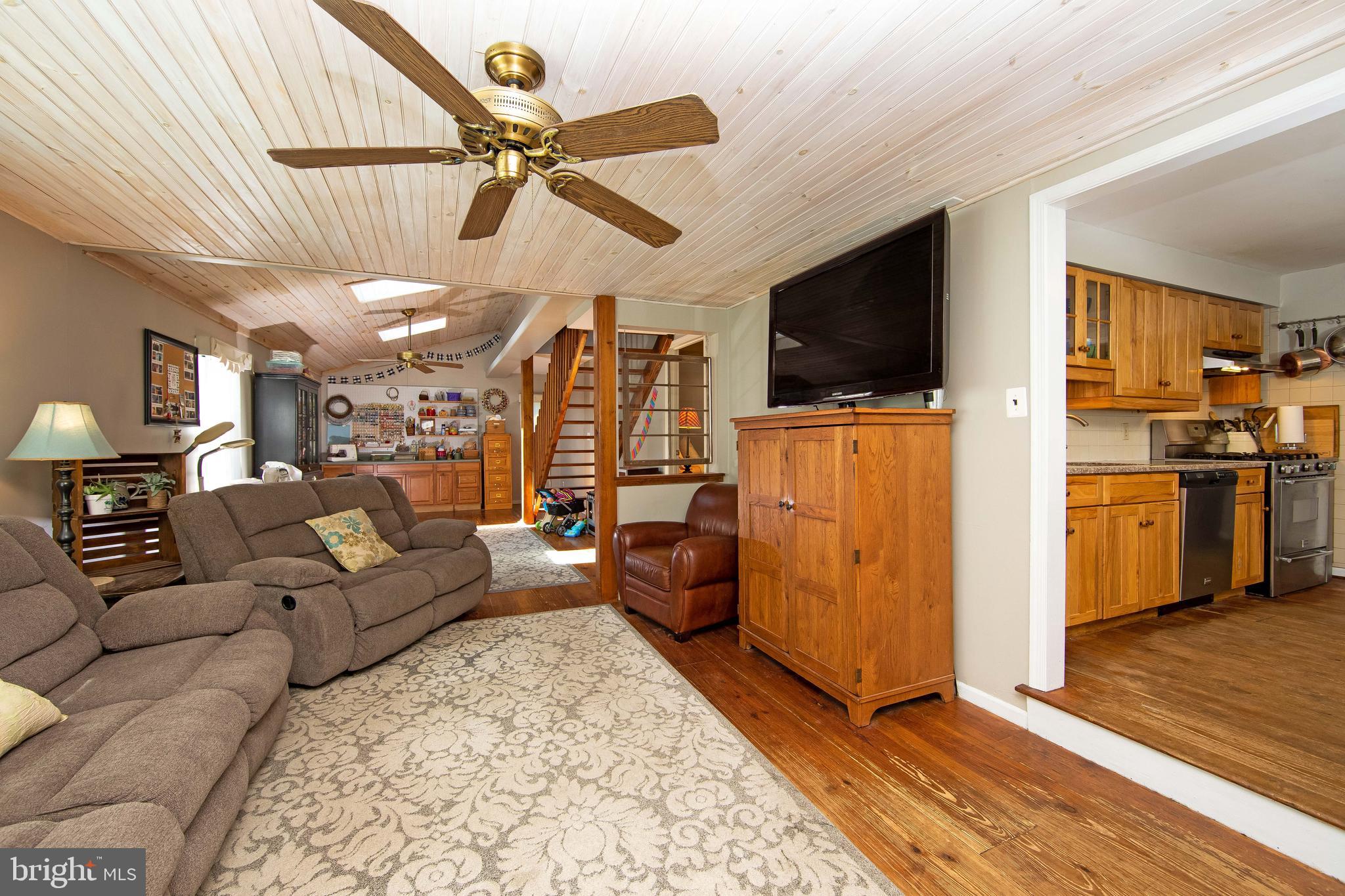 27 Wicklow Drive Tabernacle, NJ 08088 - Photo 17 of 65 a living room with furniture and a flat screen tv