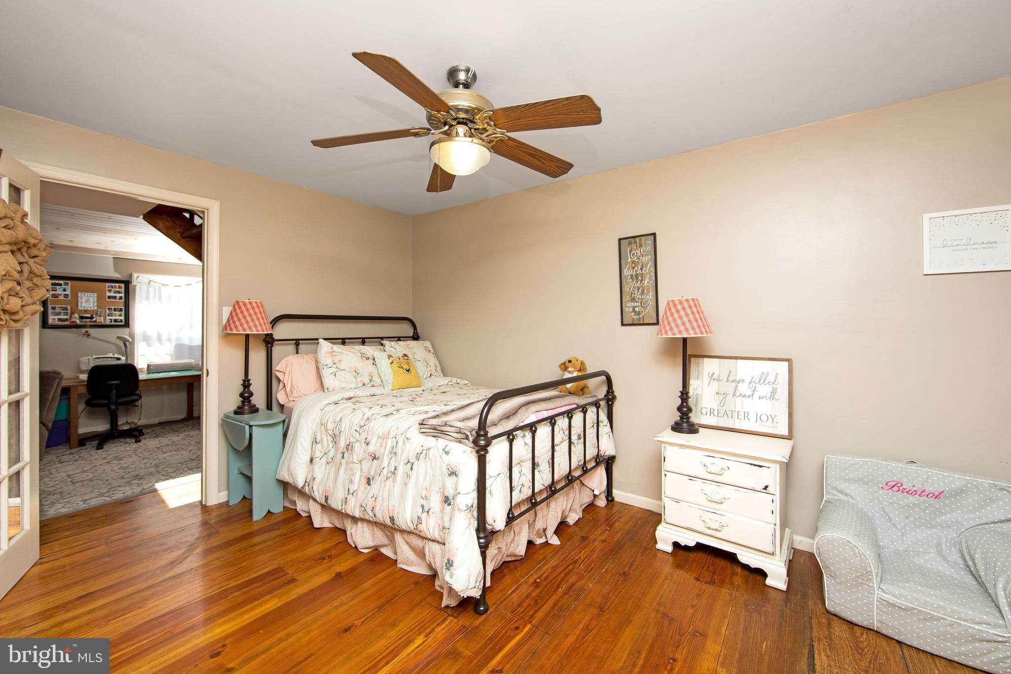 27 Wicklow Drive Tabernacle, NJ 08088 - Photo 28 of 65 a bedroom with a bed and wooden floor