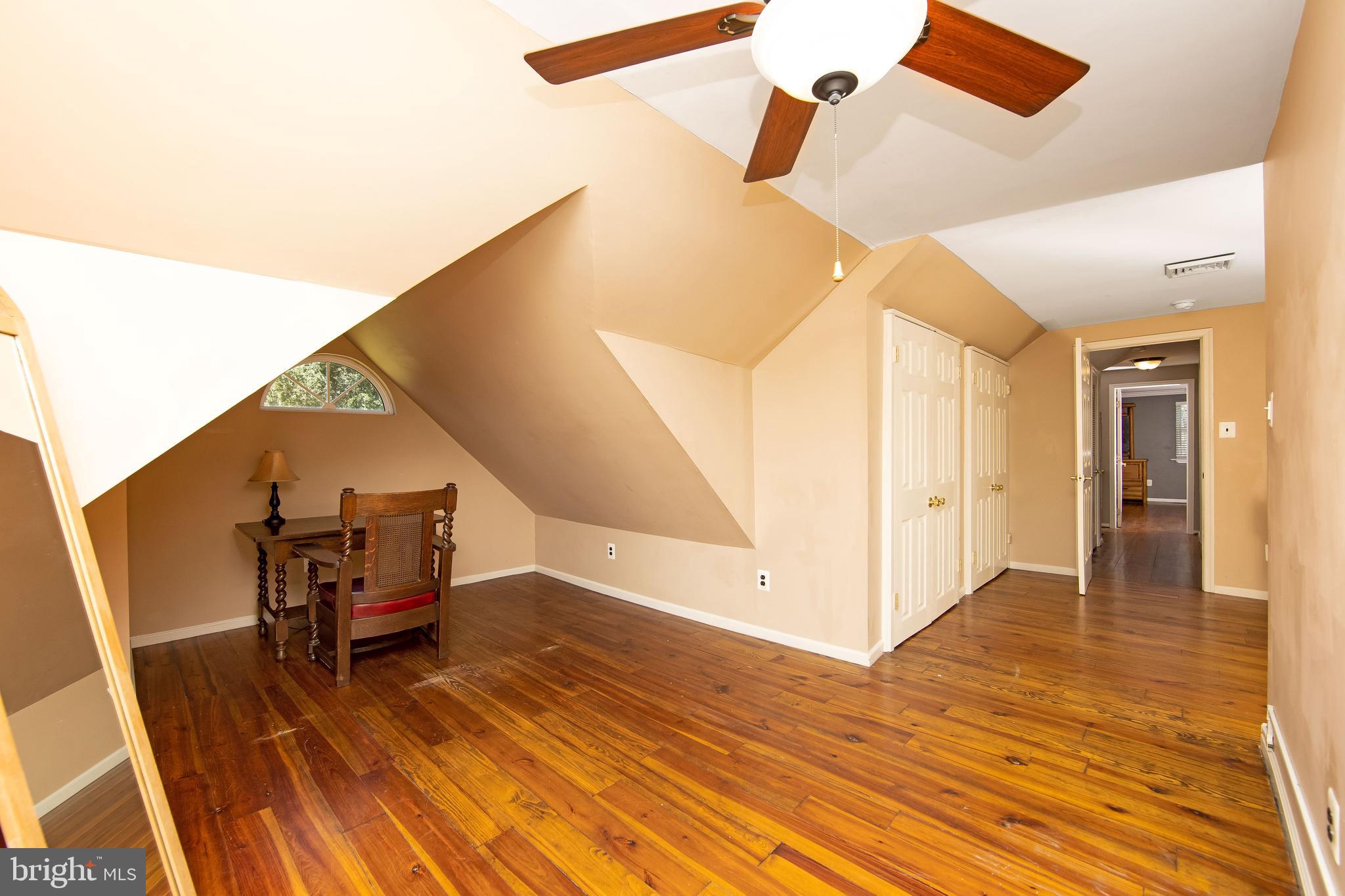 27 Wicklow Drive Tabernacle, NJ 08088 - Photo 32 of 65 a view of a livingroom with wooden floor and staircase