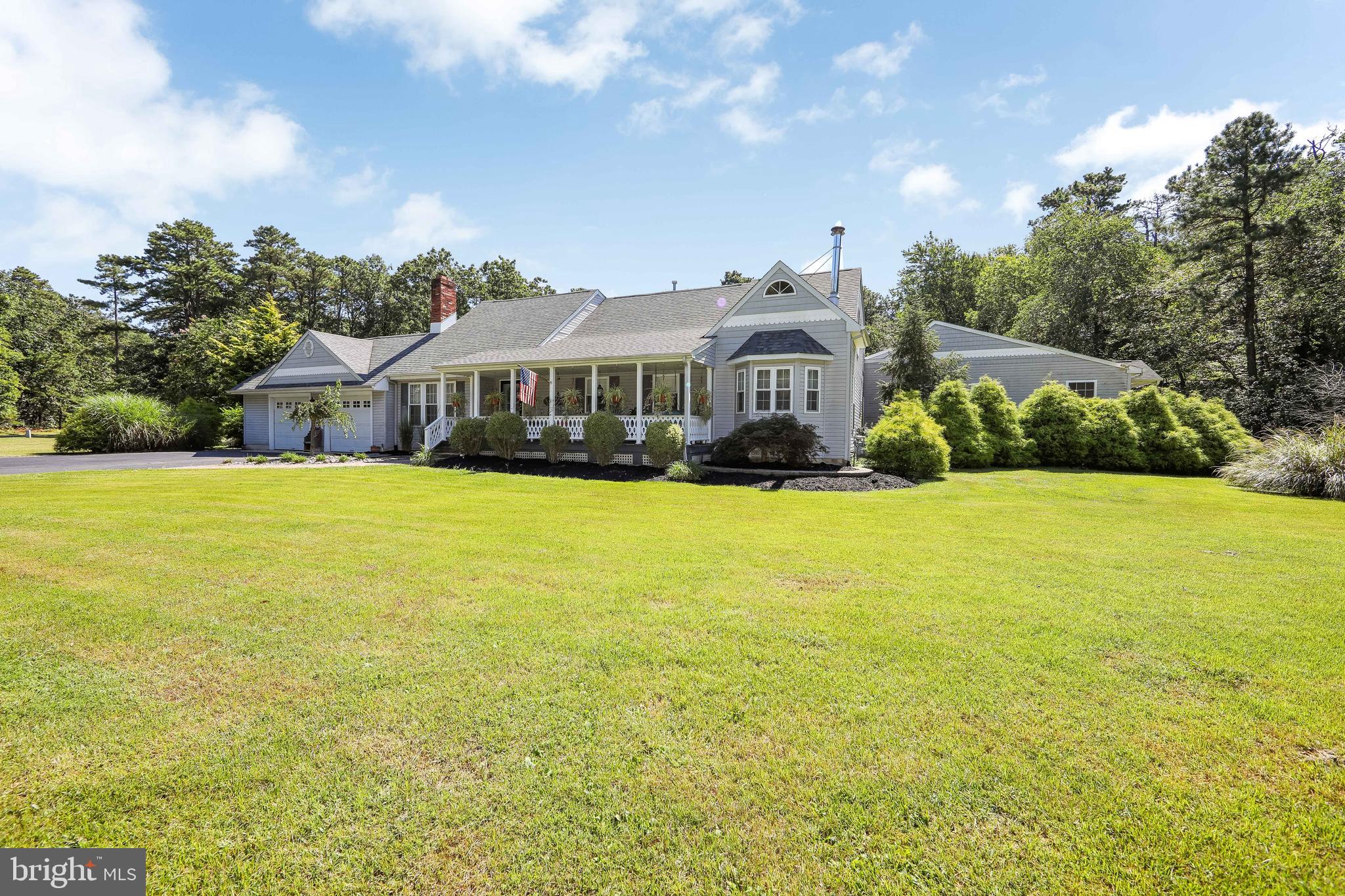 27 Wicklow Drive Tabernacle, NJ 08088 - Photo 39 of 65 a view of a house with a big yard and large trees