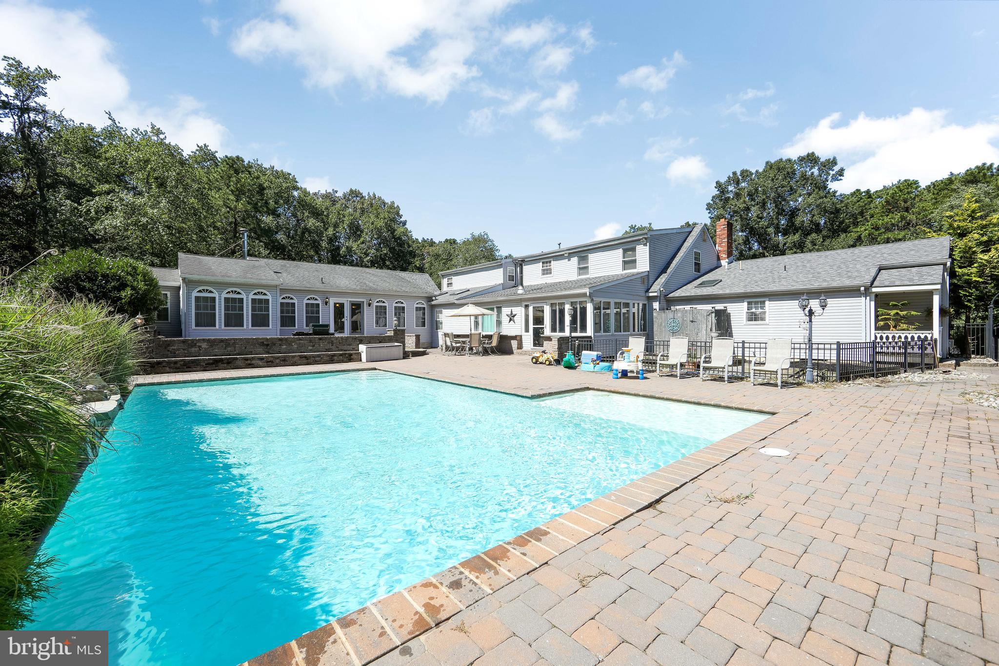 27 Wicklow Drive Tabernacle, NJ 08088 - Photo 5 of 65 a view of a house with a yard and sitting area