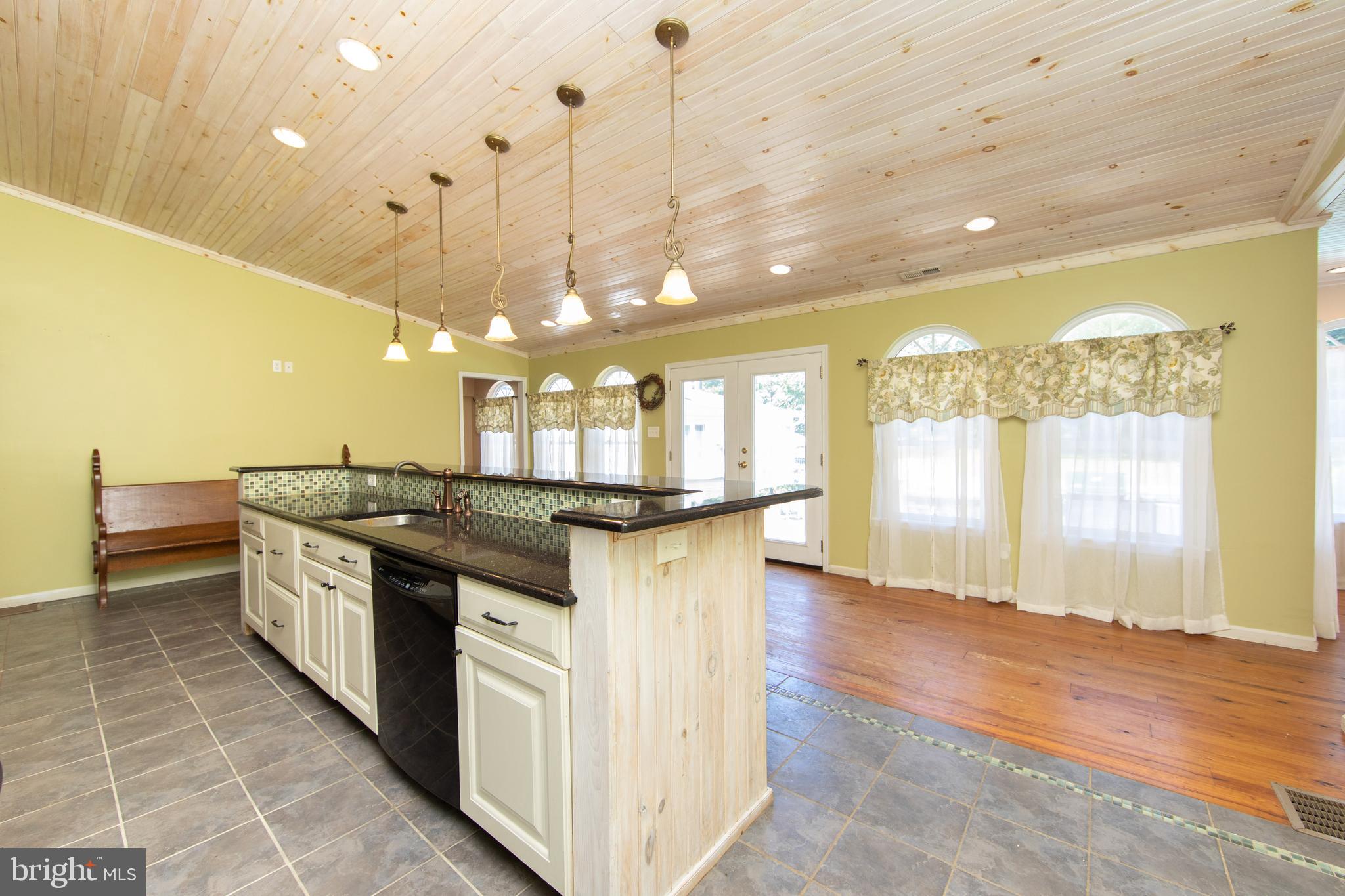 27 Wicklow Drive Tabernacle, NJ 08088 - Photo 50 of 65 a kitchen with stainless steel appliances granite countertop a stove and cabinets