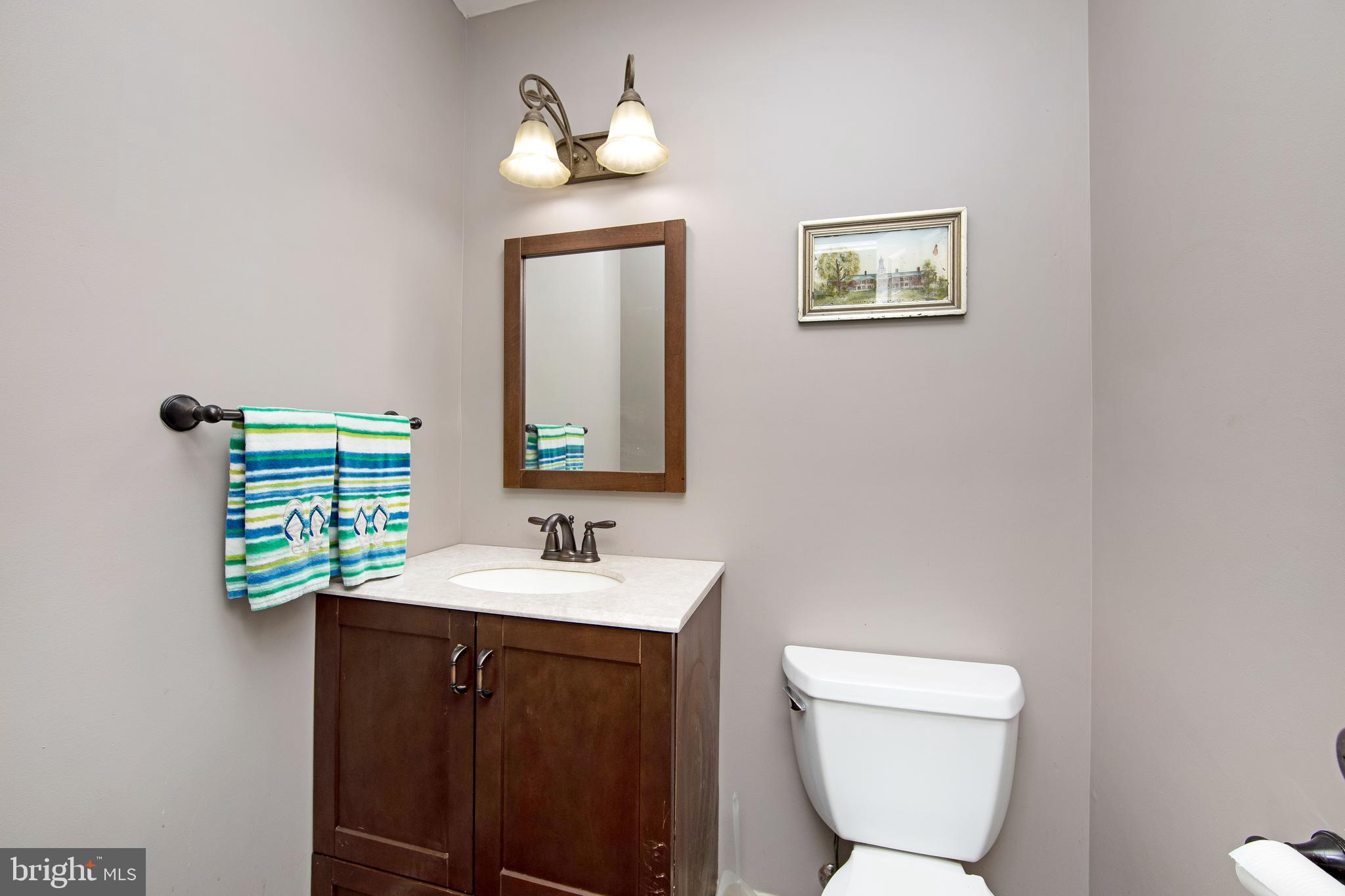 27 Wicklow Drive Tabernacle, NJ 08088 - Photo 55 of 65 a bathroom with a toilet sink and mirror
