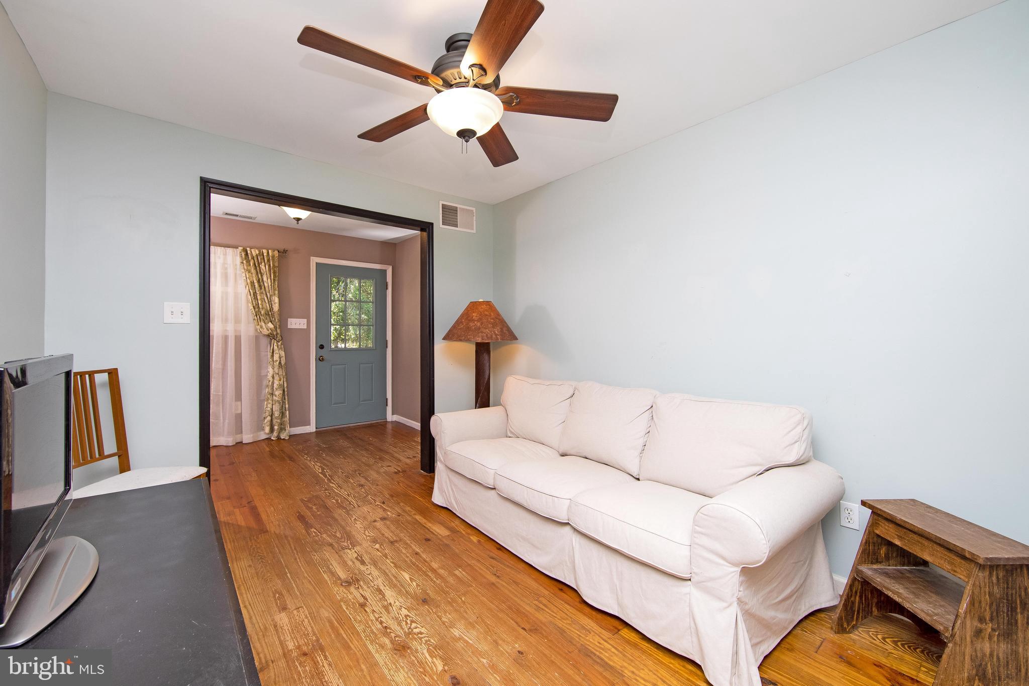 27 Wicklow Drive Tabernacle, NJ 08088 - Photo 56 of 65 a living room with furniture and a flat screen tv
