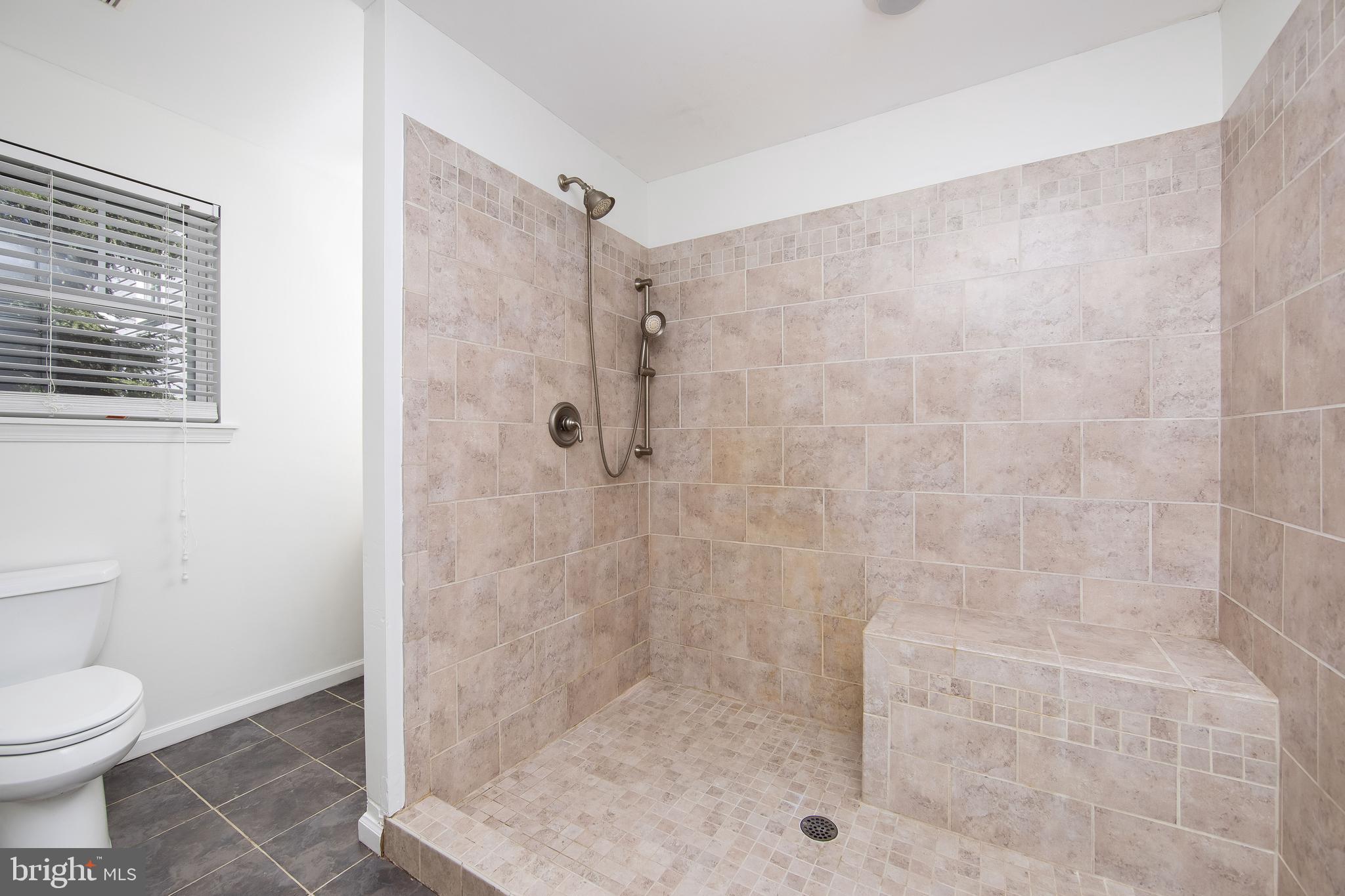 27 Wicklow Drive Tabernacle, NJ 08088 - Photo 59 of 65 a bathroom with a shower and a toilet