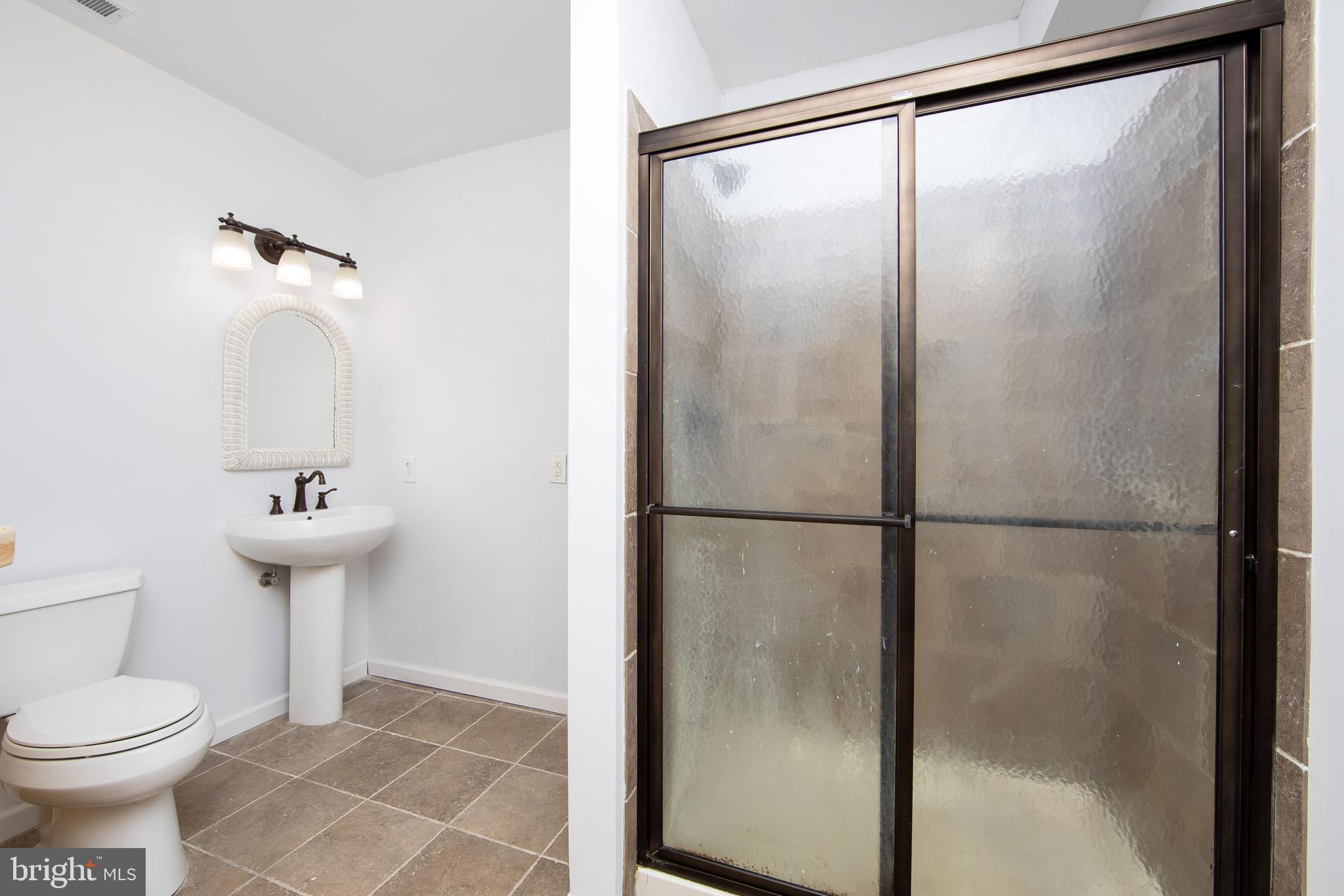 27 Wicklow Drive Tabernacle, NJ 08088 - Photo 65 of 65 a bathroom with a sink toilet and a mirror