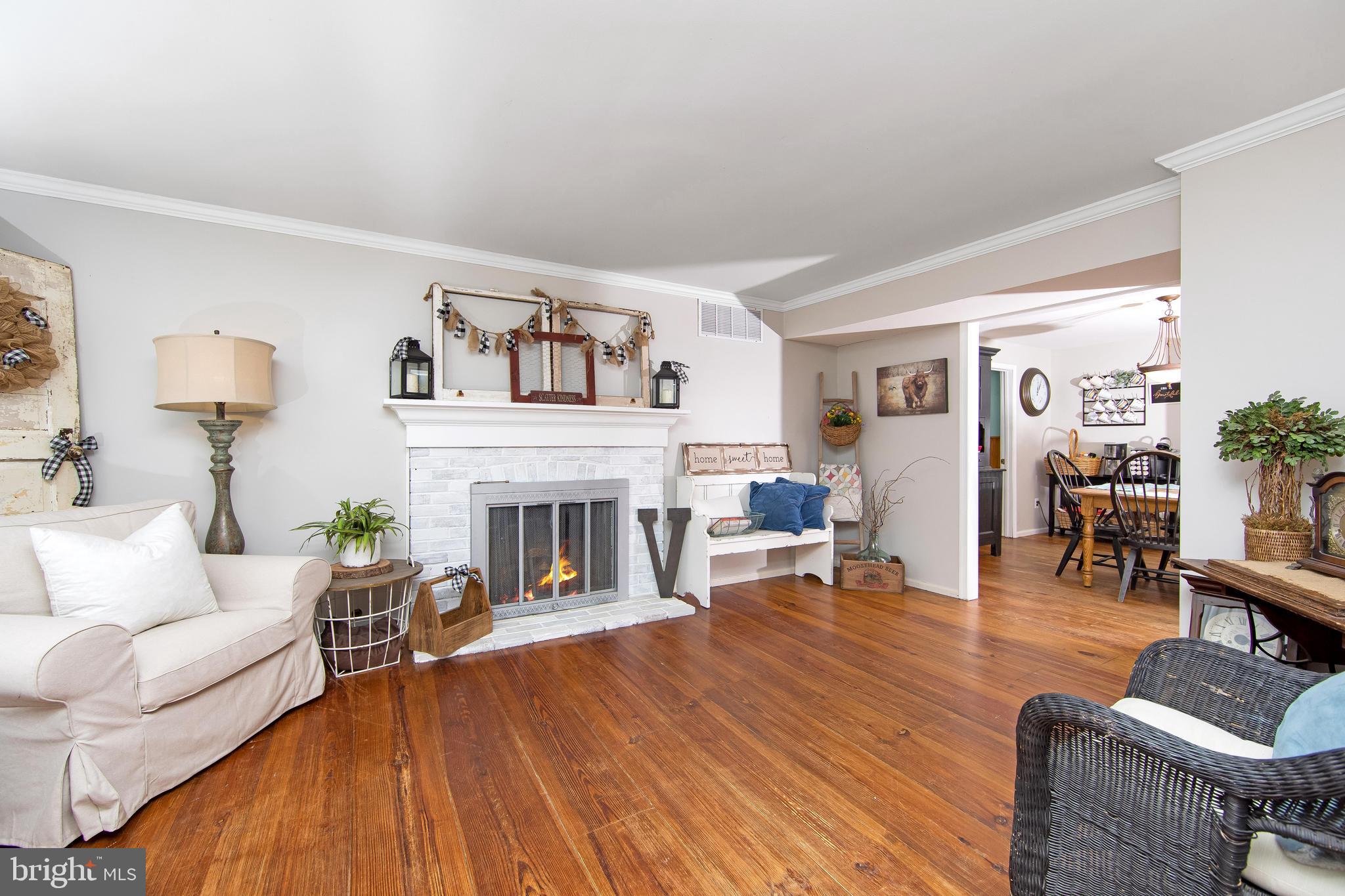 27 Wicklow Drive Tabernacle, NJ 08088 - Photo 9 of 65 a living room with furniture and a fireplace