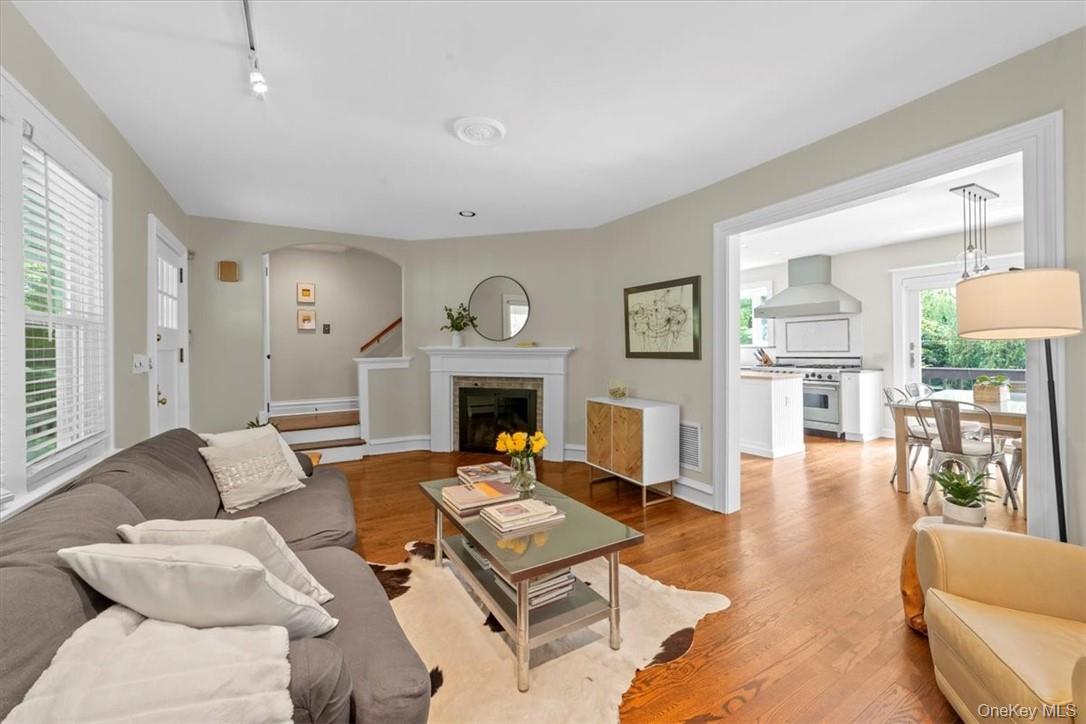 28 Inningwood Road Ossining, NY 10562 - Photo 9 of 37 Living room with light hardwood / wood-style floors and track lighting