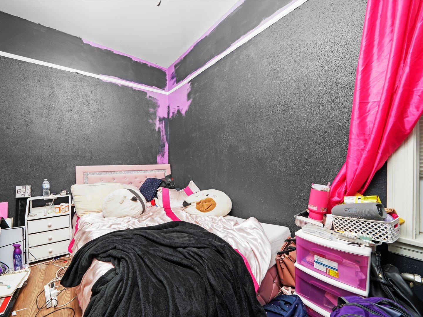 2131 North Springfield Avenue Chicago, IL 60647 - Photo 12 of 30 a bedroom with a bed and a window