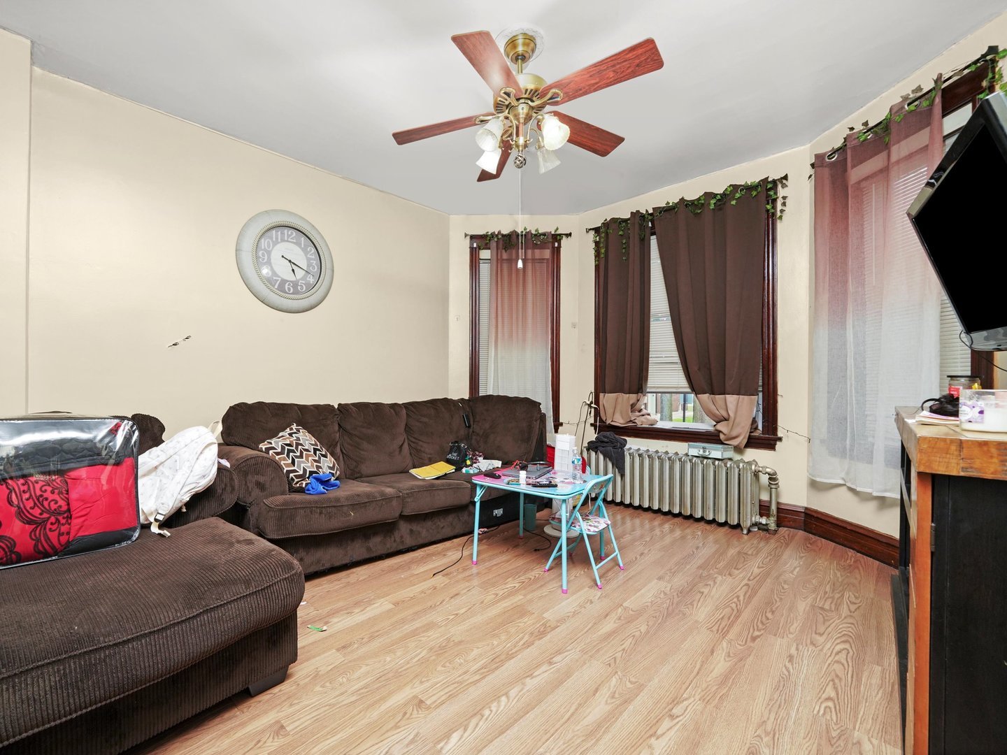 2131 North Springfield Avenue Chicago, IL 60647 - Photo 7 of 30 a living room with furniture and a flat screen tv