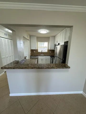 a view of street with parked cars