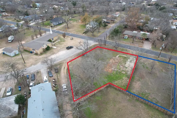a big yard with trees