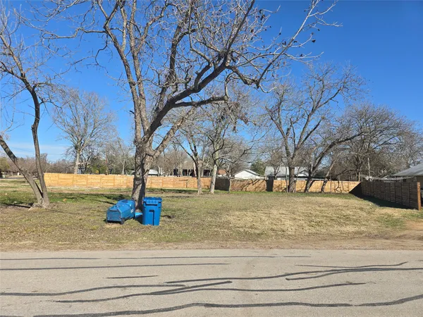 a view of outdoor space with deck and yard