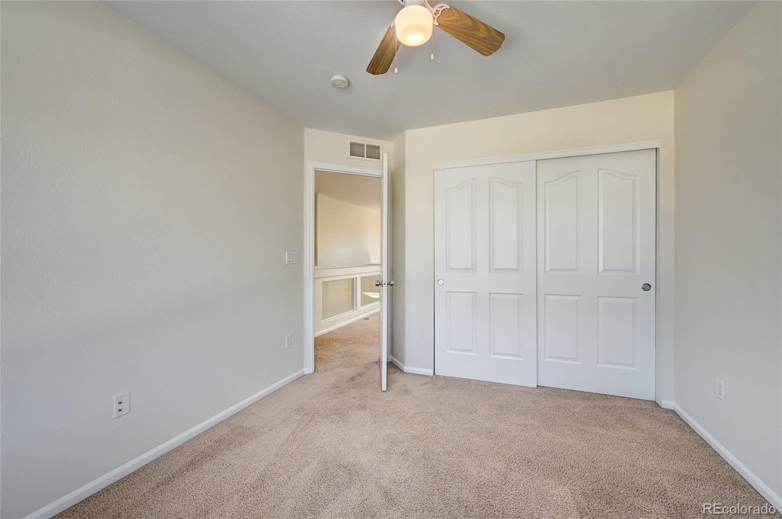20527 Robins Drive Denver, CO 80249 - Photo 22 of 25 an empty room with a empty space
