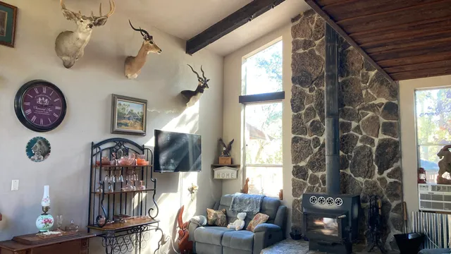 a front view of a house with entryway and wooden floor