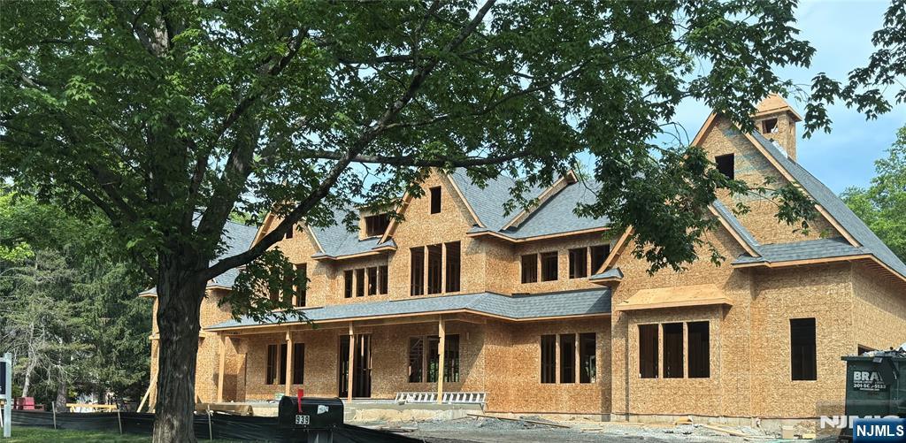 939 Briarwoods Road Franklin Lakes, NJ 07417 - Photo 2 of 2 a front view of a residential apartment building with a yard