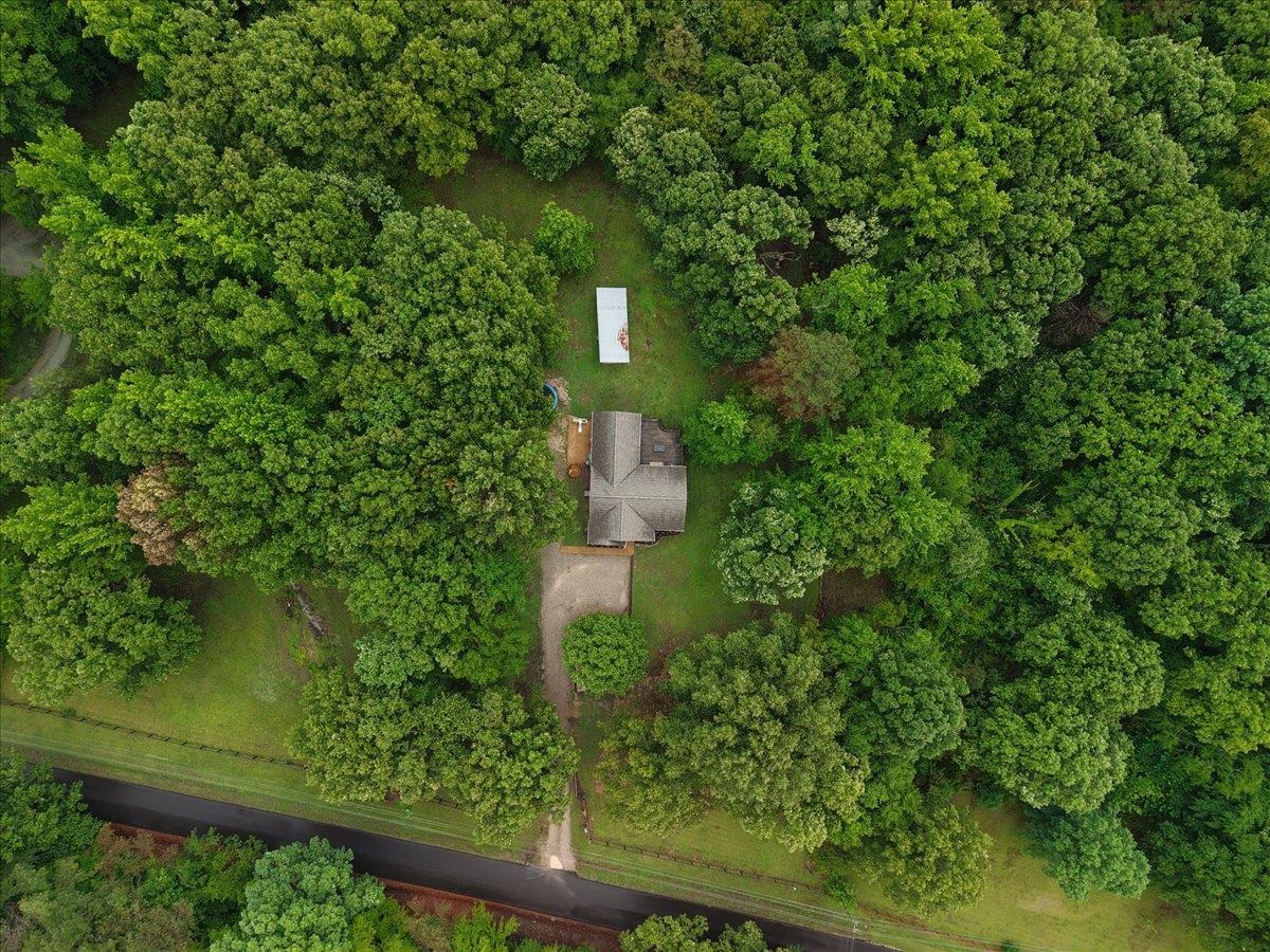 150 Liberty Road Moscow, TN 38057 - Photo 32 of 36 Aerial perspective of a property enveloped by dense, mature tree coverage