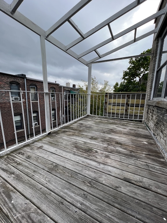 47 Hooker Street, Unit 3 Boston, MA 02134 - Photo 10 of 10 a view of balcony with wooden floor