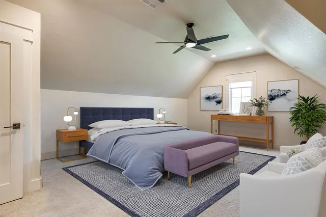 a bedroom with a bed and ceiling fan
