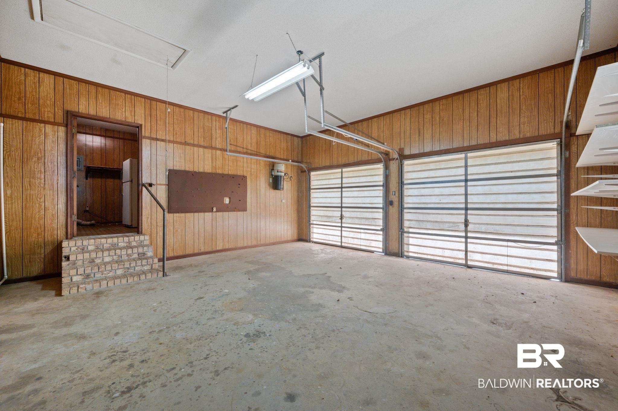 15880 Pine Grove Rd Extension West Bay Minette, AL 36507 - Photo 20 of 44 Garage with wood walls