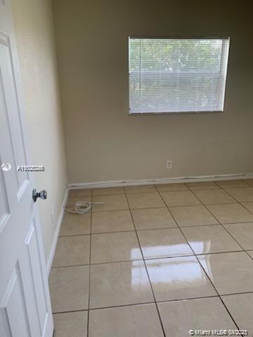 401 Southwest 13th Place, Unit 720 Deerfield Beach, FL 33441 - Photo 10 of 20 a view of a utility room