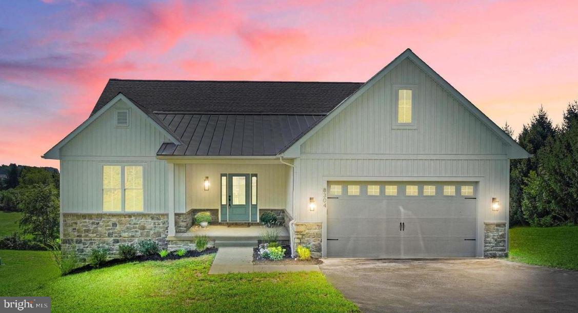 5 5 Forks Road New Freedom, PA 17349 - Photo 1 of 30 a front view of a house with garden