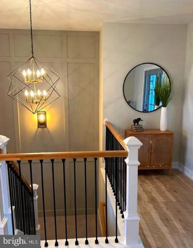 5 5 Forks Road New Freedom, PA 17349 - Photo 14 of 30 a view of a livingroom with furniture wooden floor chandelier and a mirror