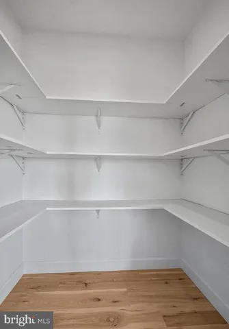 a view of an empty walk in closet
