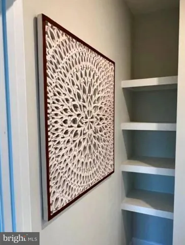 a view of balcony with wooden floor and fence