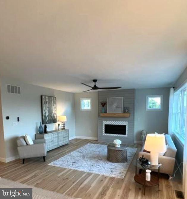 5 5 Forks Road New Freedom, PA 17349 - Photo 4 of 30 a living room with furniture and a fireplace
