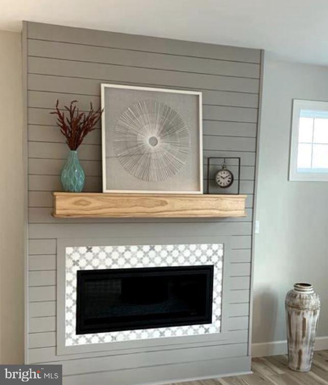 5 5 Forks Road New Freedom, PA 17349 - Photo 5 of 30 a fireplace with a hallway