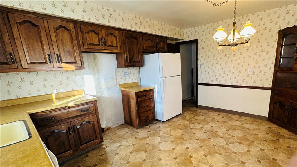 133 Old Pike Road Freeport, PA 16229 - Photo 13 of 30 Kitchen. Wood cabinets. Built in china cupboard. Refrigerator stays.